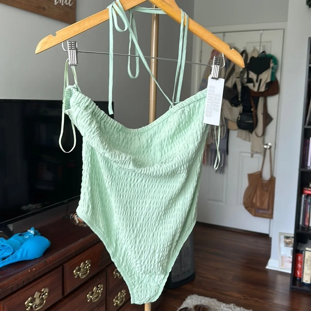 Urban outfitters light green ruched body suit size medium artsy tie front